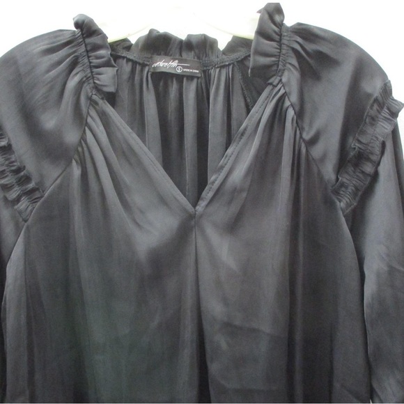 Beautiful black silky peasant blouse. Cute ruffle detail on top with neck tie. - Picture 5 of 7